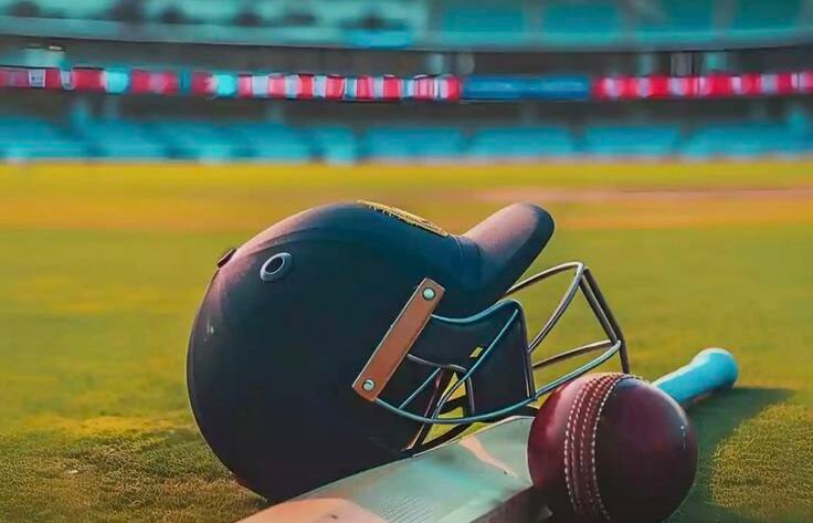 a Pakistani helmet, bate and boll on the ground